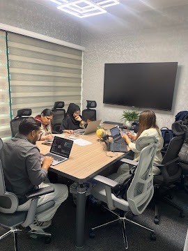 Conference room with team strategy meeting