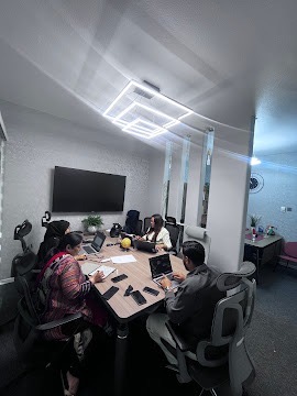 Open-plan workstations with modern lighting